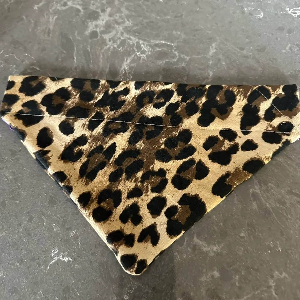 Handcrafted dog bandanna in medium Measures 10 inches. Can customize if desired